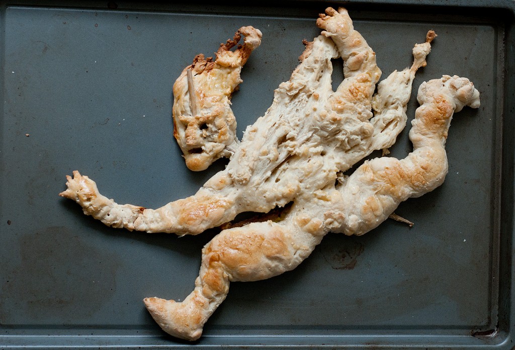 Bread figure of person running away from tsunami warning in Japan